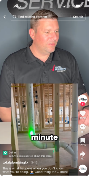 Plumber in branded shirt watching plumbing setup video on screen with green laser level