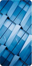 Abstract close-up of a building facade with a geometric pattern of blue and white panels.